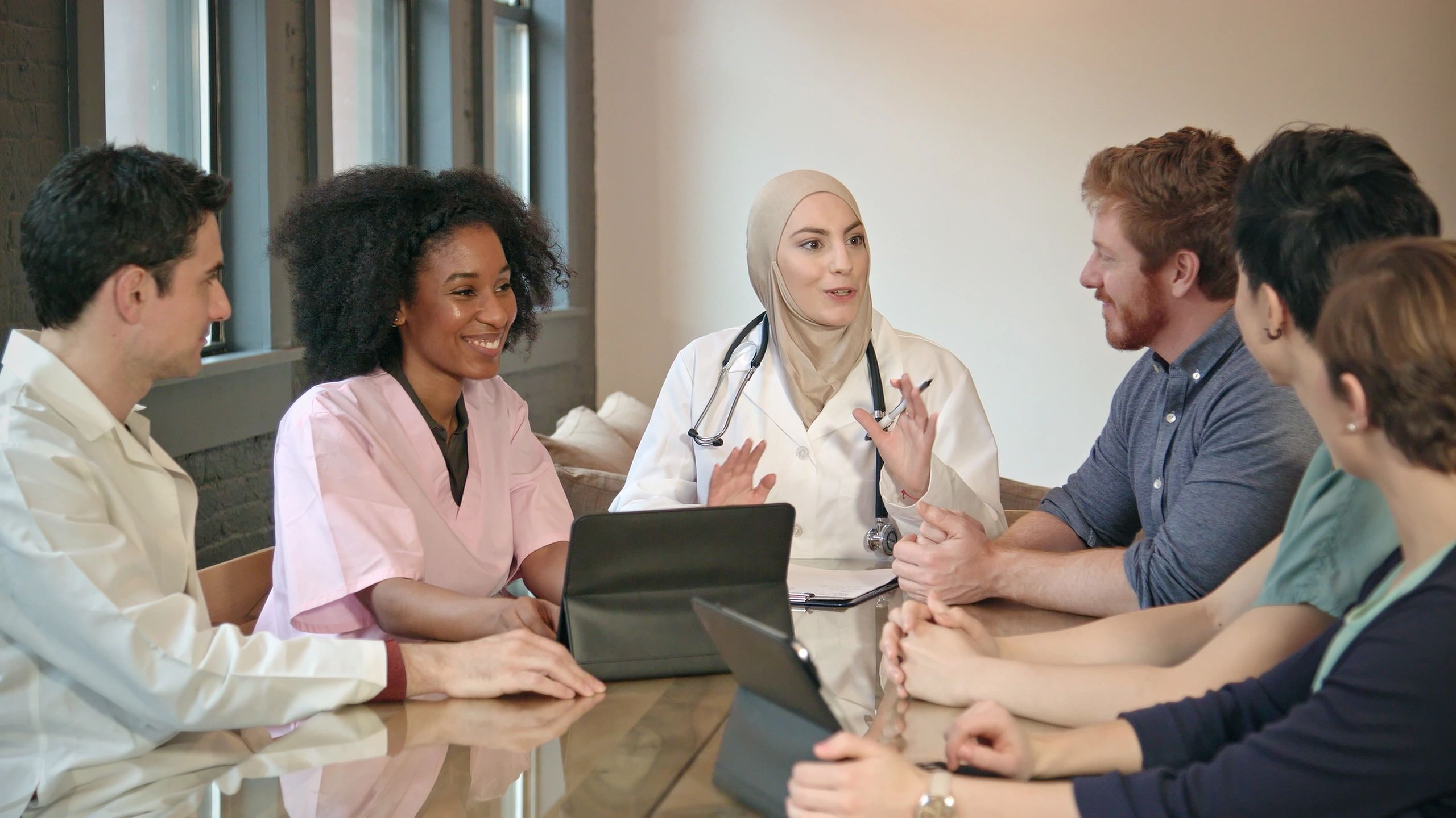 Healthcare professionals meeting together